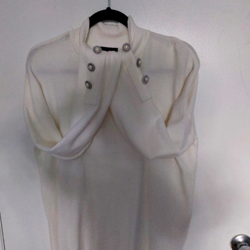 Super soft white mock neck sweater and Black pants as an outfit